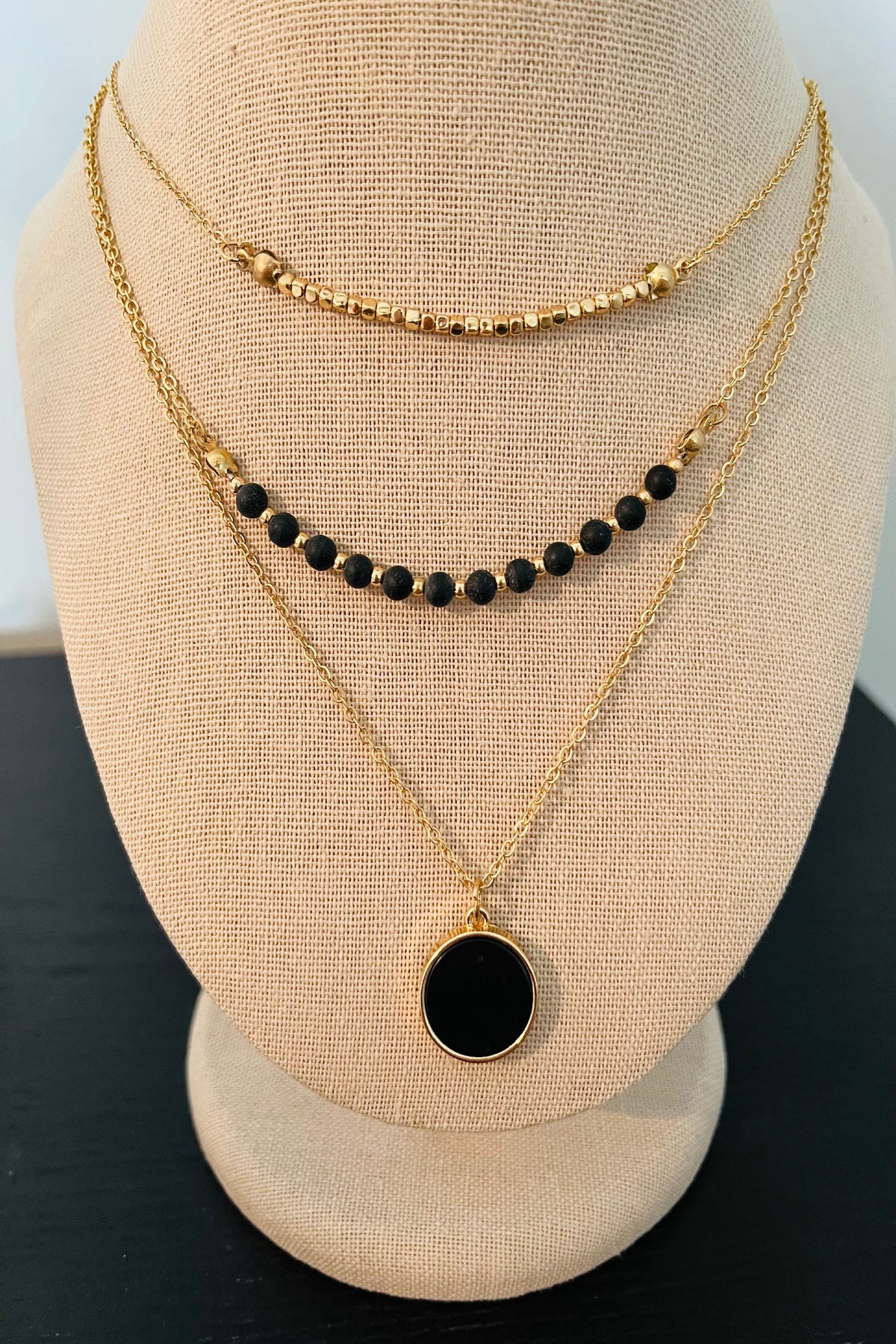 Gold Necklace with Black Pendant